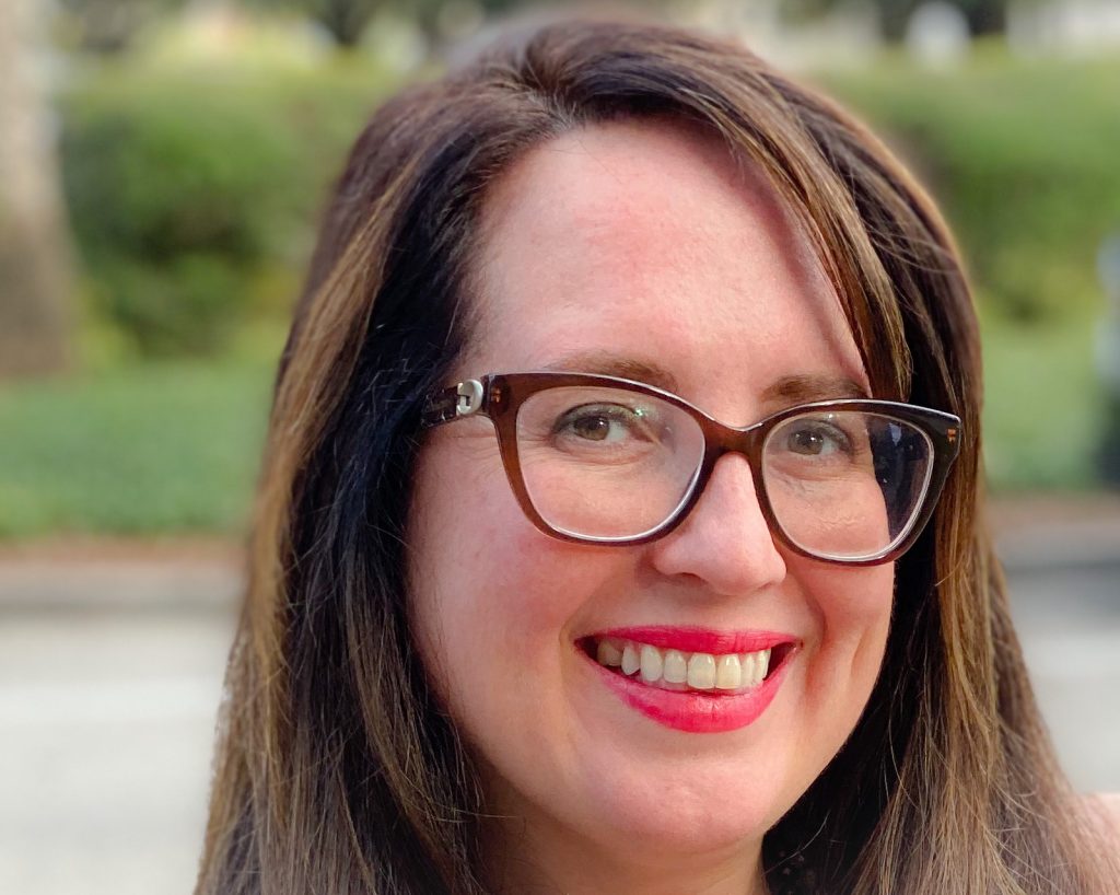 brunette woman wearing cat eye glasses